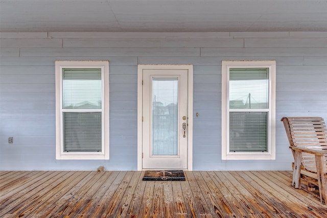 entrance to property with a wooden deck