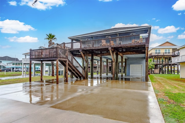 exterior space with a deck and a lawn