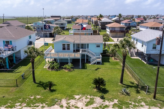 birds eye view of property with a residential view