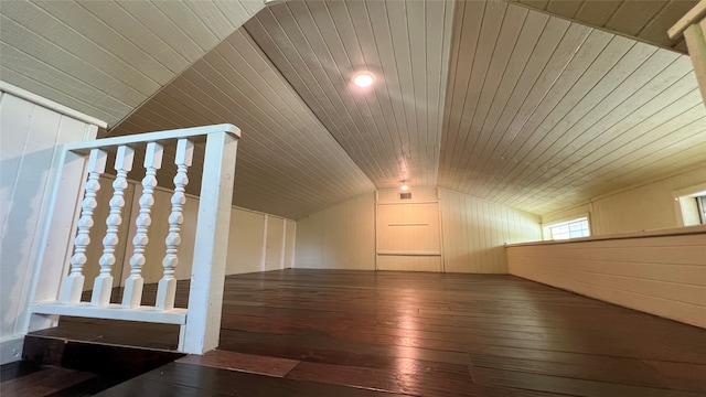 additional living space featuring wood-type flooring, lofted ceiling, and wood ceiling