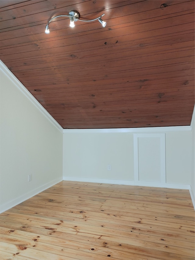 bonus room featuring wooden ceiling, light hardwood / wood-style flooring, and lofted ceiling