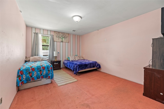 bedroom featuring carpet flooring