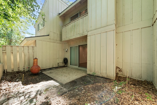 back of property featuring a patio