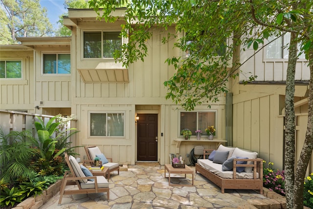 back of house with a patio and an outdoor hangout area