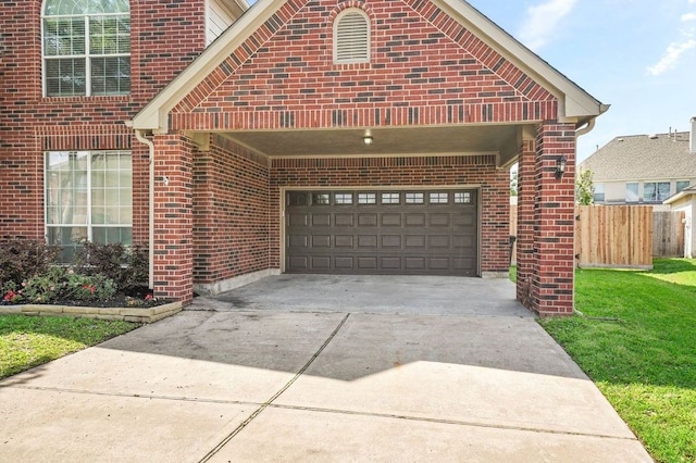 garage with a lawn