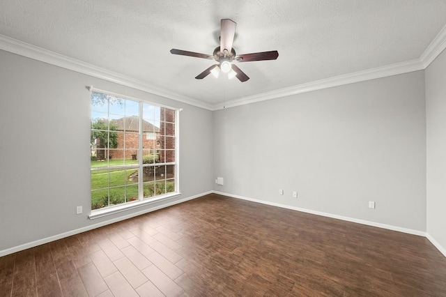 empty room with ornamental molding, dark hardwood / wood-style flooring, ceiling fan, and plenty of natural light