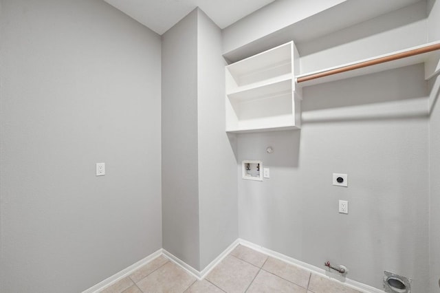 laundry area with light tile flooring, hookup for a gas dryer, washer hookup, and electric dryer hookup