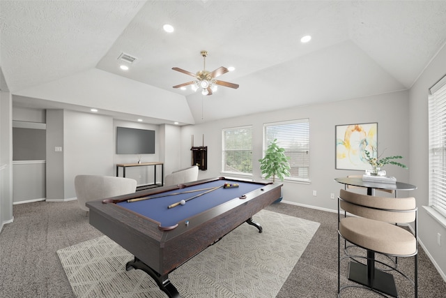 game room with lofted ceiling, dark colored carpet, ceiling fan, and billiards