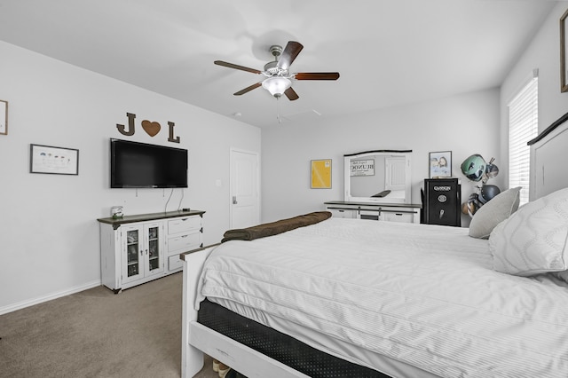 bedroom with light colored carpet and ceiling fan