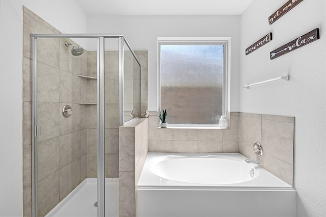 bathroom featuring plus walk in shower