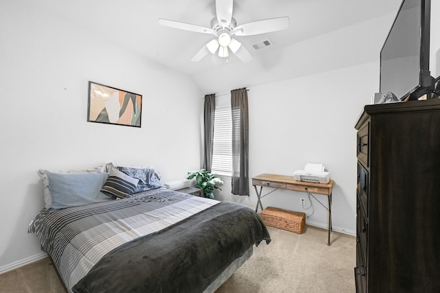 carpeted bedroom featuring ceiling fan and lofted ceiling