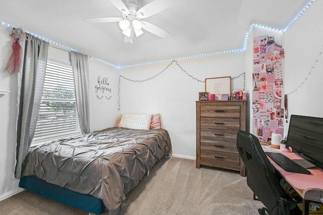 carpeted bedroom with ceiling fan