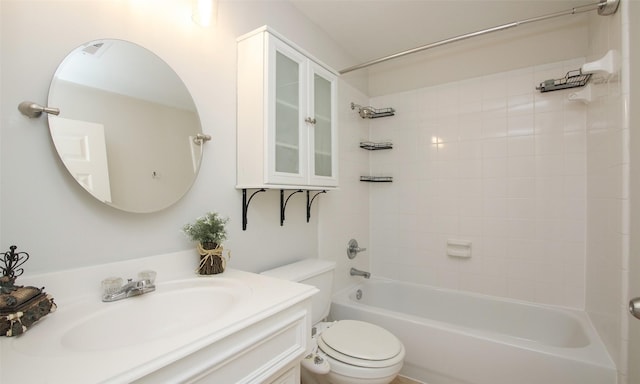 full bathroom with vanity, toilet, and tiled shower / bath