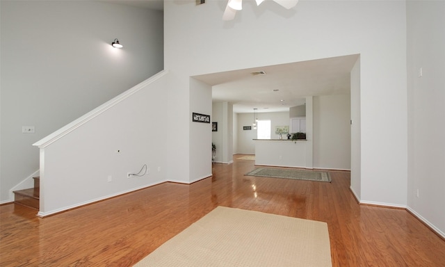 unfurnished living room featuring wood-type flooring