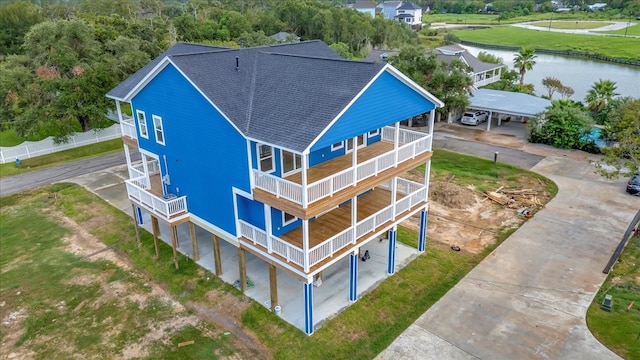 drone / aerial view featuring a water view