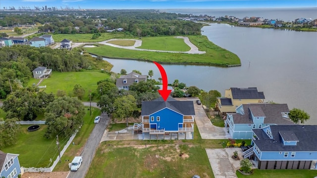 birds eye view of property featuring a water view