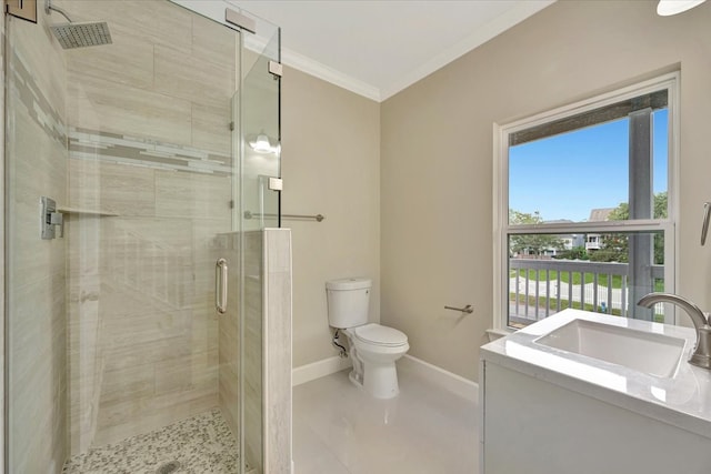 bathroom with vanity, toilet, ornamental molding, tile patterned flooring, and a shower with door