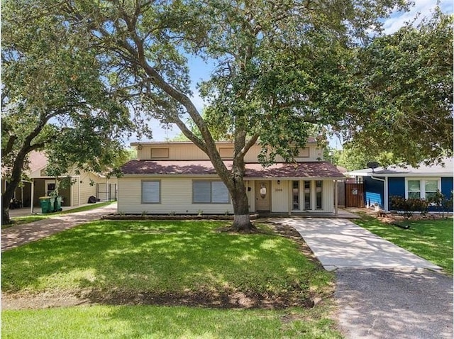 view of front of home with a front lawn