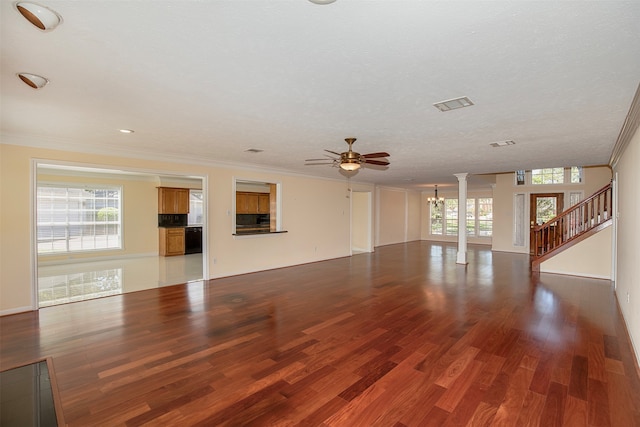 unfurnished living room with ceiling fan, crown molding, and hardwood / wood-style flooring