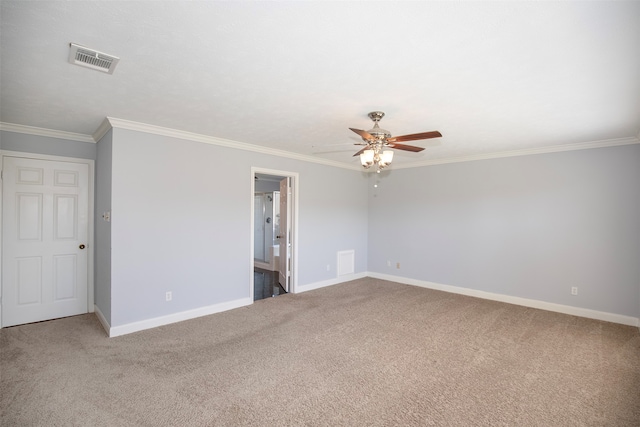 carpeted empty room with ceiling fan and ornamental molding