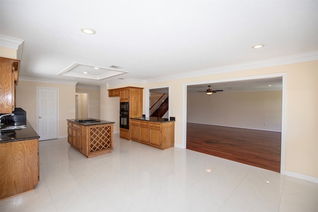 kitchen featuring sink, light tile floors, and ornamental molding