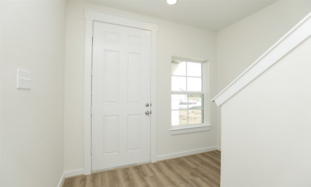 entrance foyer with light wood-type flooring