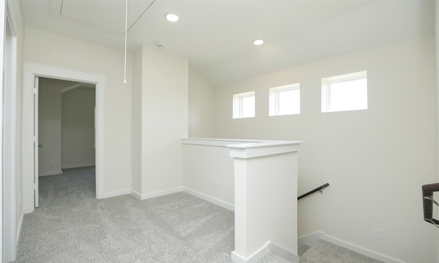 interior space featuring light colored carpet