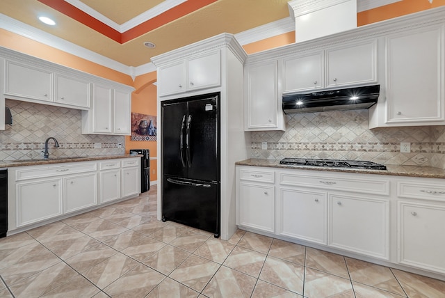 kitchen with ornamental molding, tasteful backsplash, white cabinetry, and black appliances