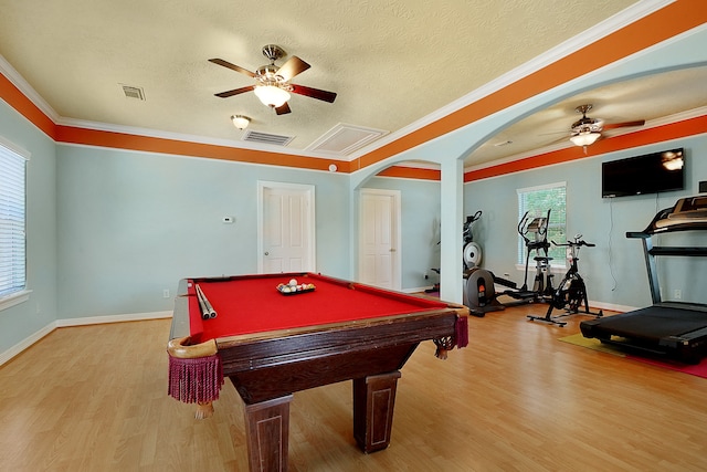 recreation room featuring billiards, ceiling fan, hardwood / wood-style flooring, and ornamental molding