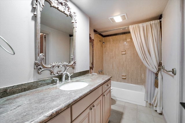 bathroom featuring shower / tub combo with curtain, vanity, and tile patterned floors