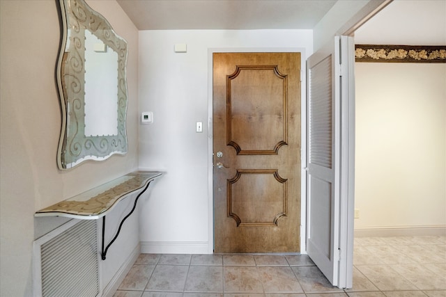 interior space with tile patterned floors