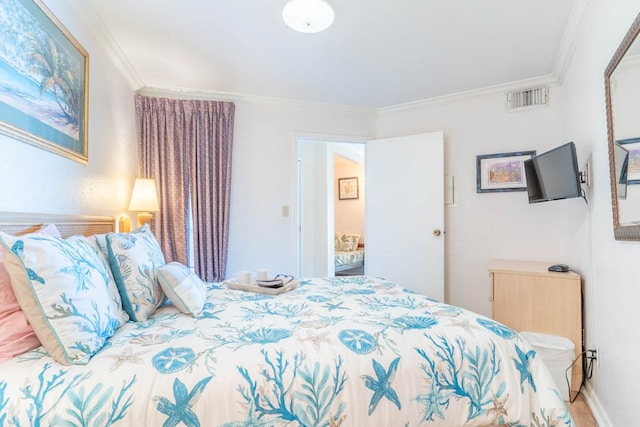 bedroom featuring ornamental molding