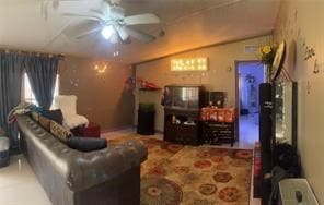 living room with ceiling fan