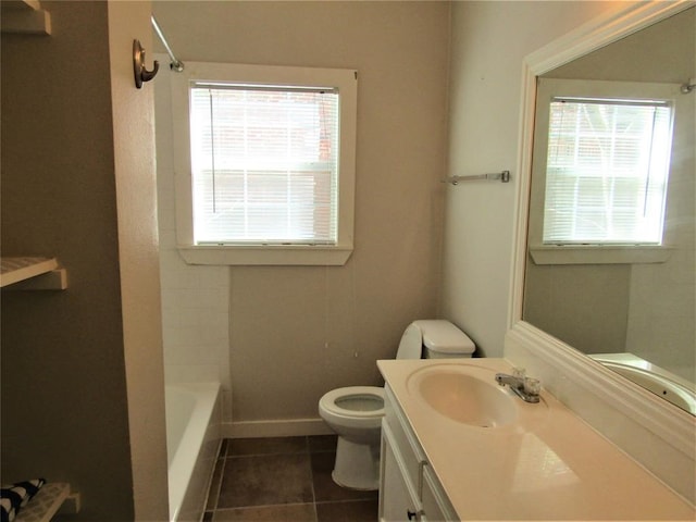 full bathroom featuring tile flooring, vanity, bathtub / shower combination, and toilet