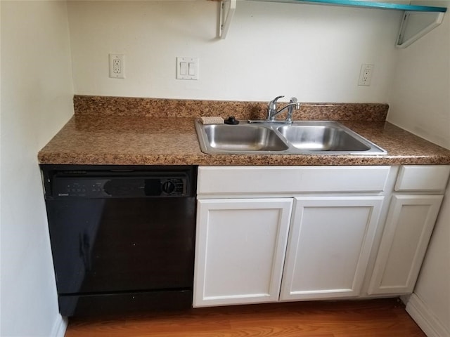 kitchen with light hardwood / wood-style floors, dishwasher, white cabinetry, and sink