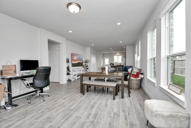 dining room with light hardwood / wood-style flooring