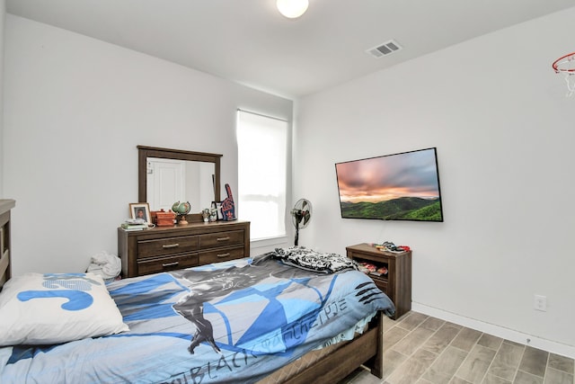 bedroom featuring light hardwood / wood-style flooring