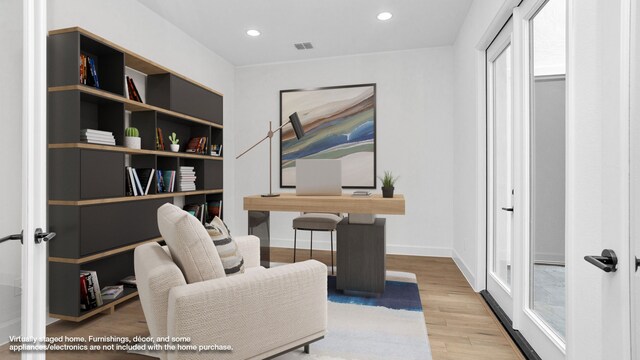 office featuring french doors and light wood-type flooring