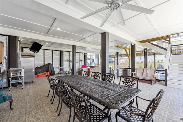 interior space featuring ceiling fan and coffered ceiling