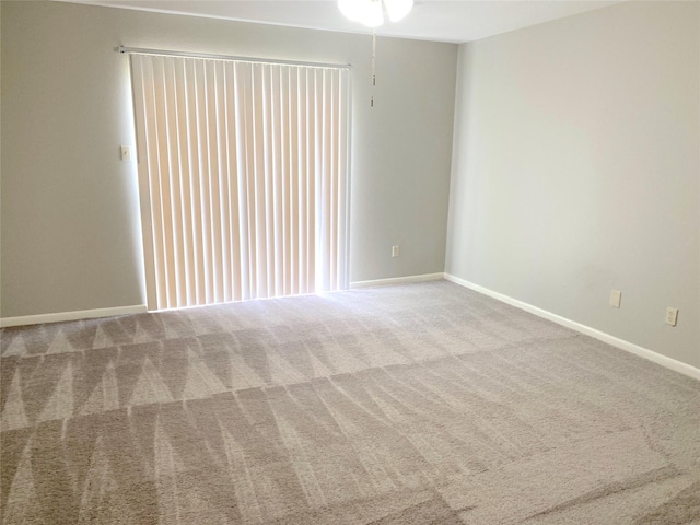 unfurnished room with carpet