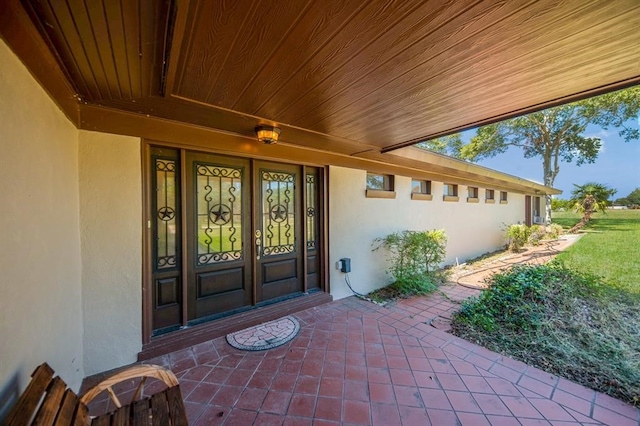 entrance to property with a patio area