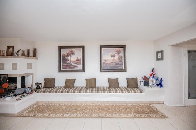 unfurnished room featuring light tile flooring