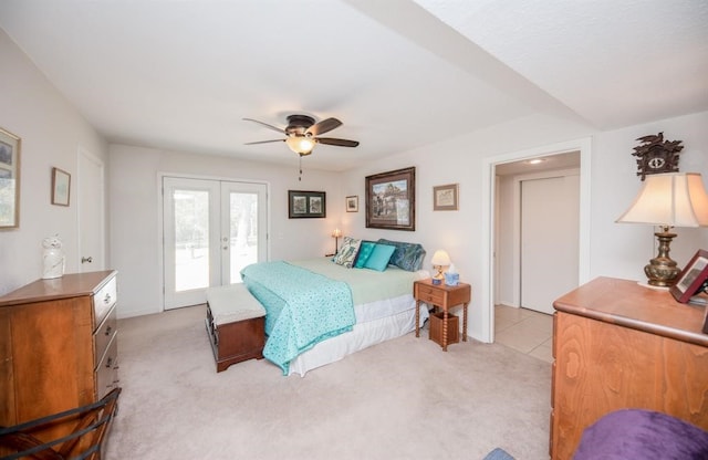 bedroom with light colored carpet, french doors, ceiling fan, and access to exterior