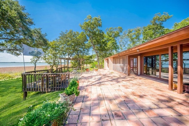 view of patio / terrace featuring a water view