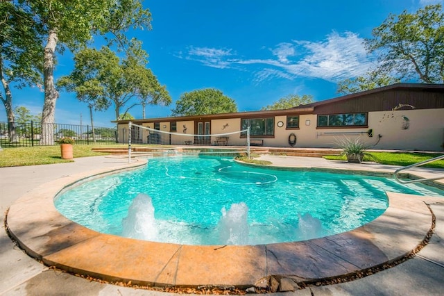 view of swimming pool featuring a patio area