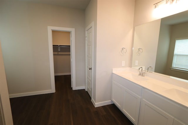 bathroom featuring vanity and wood-type flooring