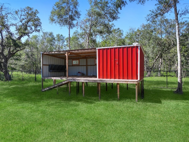 view of outdoor structure with a lawn