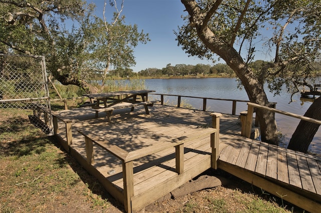 dock area with a water view