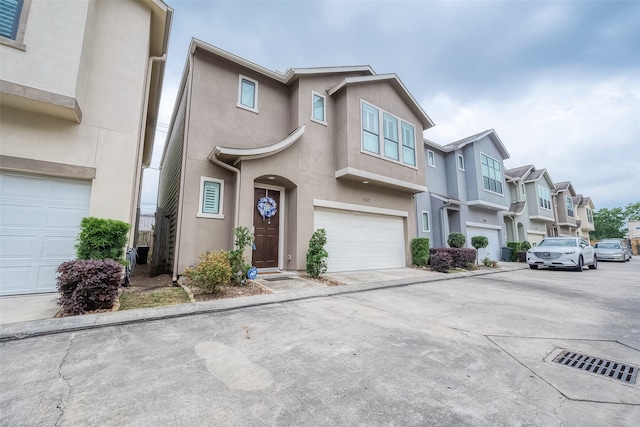 townhome / multi-family property featuring a garage