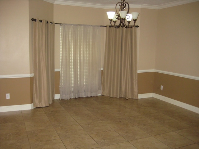 tiled empty room featuring a notable chandelier and crown molding